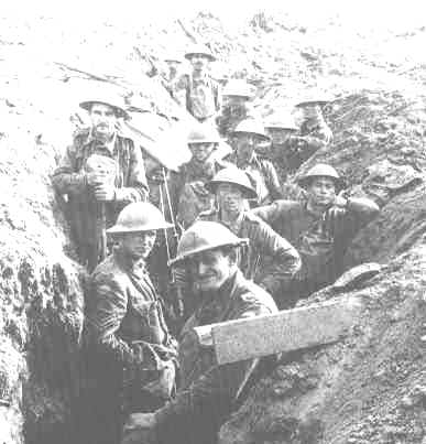 A group of Diggers in a trench in France. Fully armed and ready to go.